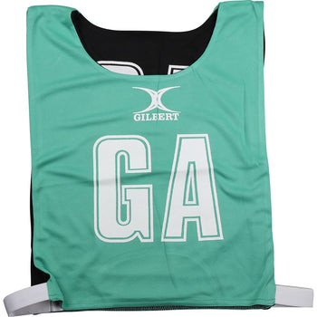 NCEA14NetballBibs Reversible Green Black Bib